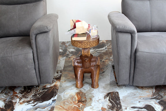 Haussmann Elephant Chang Hand-Carved Solid Wood End Table, Walnut, 15 in dia x 20 in H, in a room with flowers on top