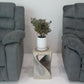 Agate Grey Original Twist hand-carved wood end table, 10 x 10 x 16 inches, in a furnished room