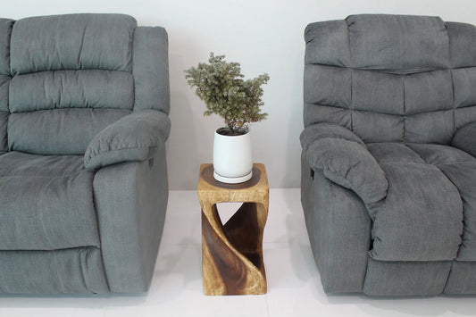 Walnut Original Twist hand-carved wood end table, 10 x 10 x 18 inches, in a furnished room
