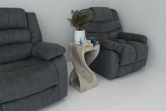 Agate Grey Original Twist hand-carved wood end table, 12 x 12 x 23 inches, in a furnished room