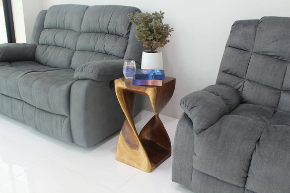 Walnut Original Twist hand-carved wood end table, 12 x 12 x 26 inches, in a furnished room