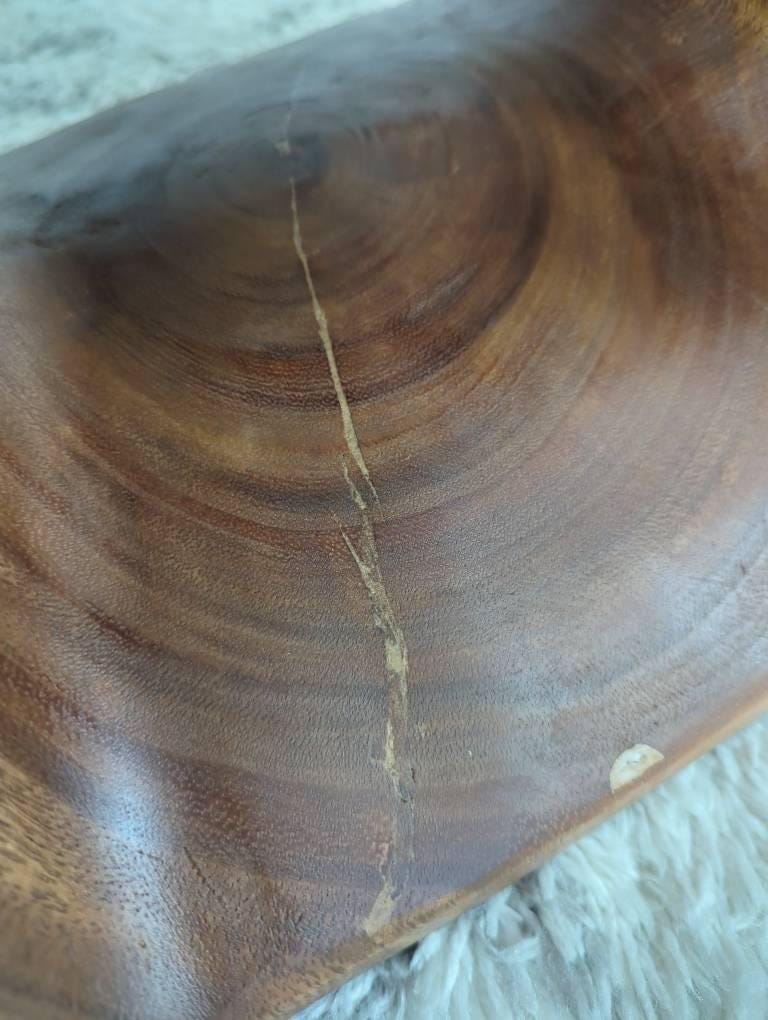 Natural grain and color variations in handcrafted solid wood