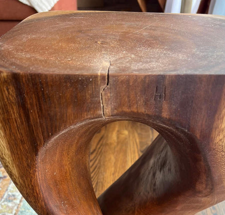 Natural grain and color variations in handcrafted solid wood